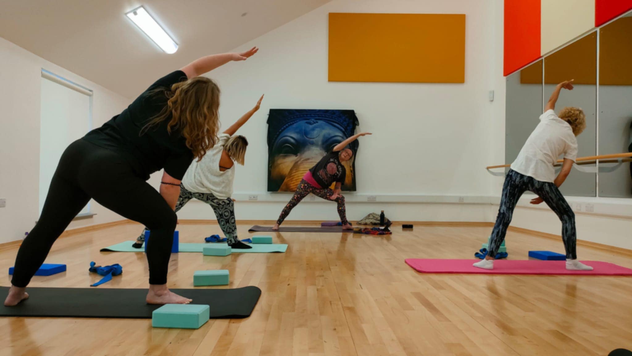 Debbie leading a yoga class in Dunfermline